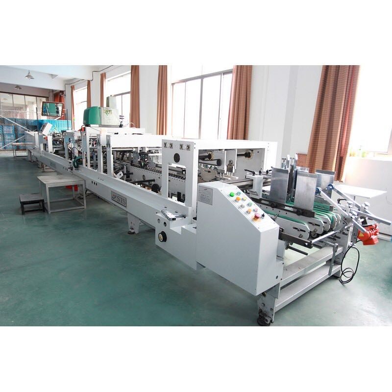automatic machine for folding boxes